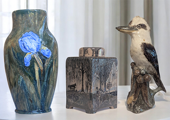 Marian Munday - Vase decorated with an iris L.J. Harvey - Kookaburra figurine (with beetle)
