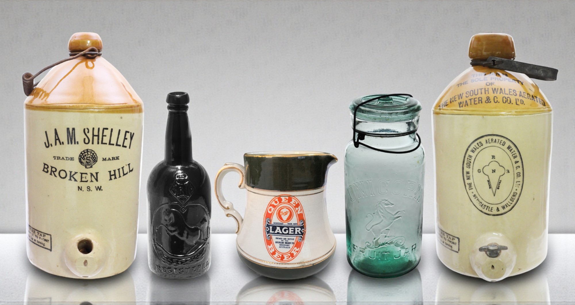 black horse ale, unicorn fruit jar, j.a.m shelley broken hill demijohn, queen beer lager brisbane water jug, the new south wales aerated water demijohn