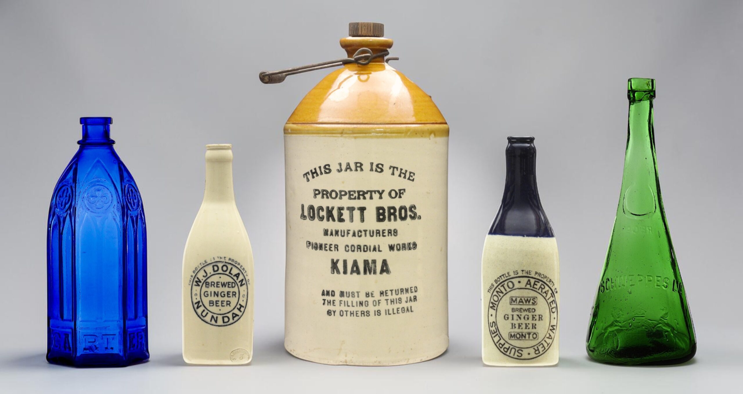 carters cobalt blue catherdal ink bottle, w.j. dolan nundah champgane ginger beer bottle, monto aerated water supplies champgane two toned ginger beer bottle, tapered schweppes ld green cordial bottle